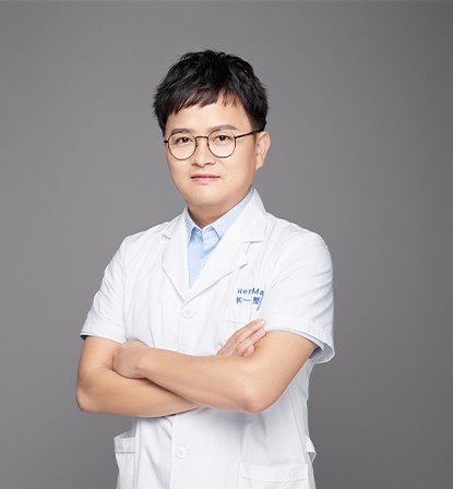 何煒華