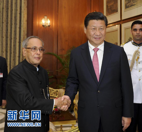 9月18日，國(guó)家主席習(xí)近平在新德里會(huì)見(jiàn)印度總統(tǒng)慕克吉。 新華社記者張鐸 攝 