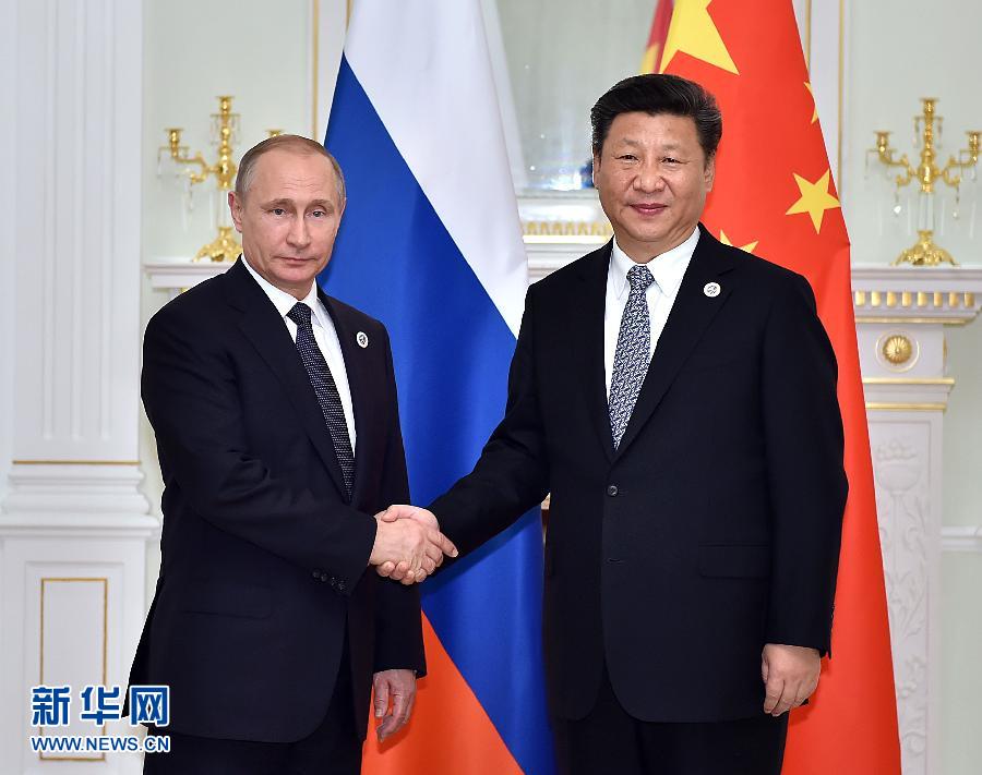 6月23日，國家主席習(xí)近平在烏茲別克斯坦塔什干會見俄羅斯總統(tǒng)普京。新華社記者李濤攝